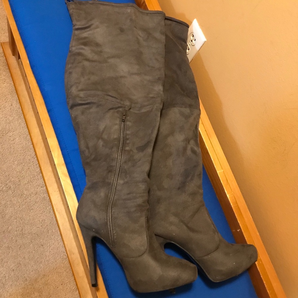 Knee high heeled boots